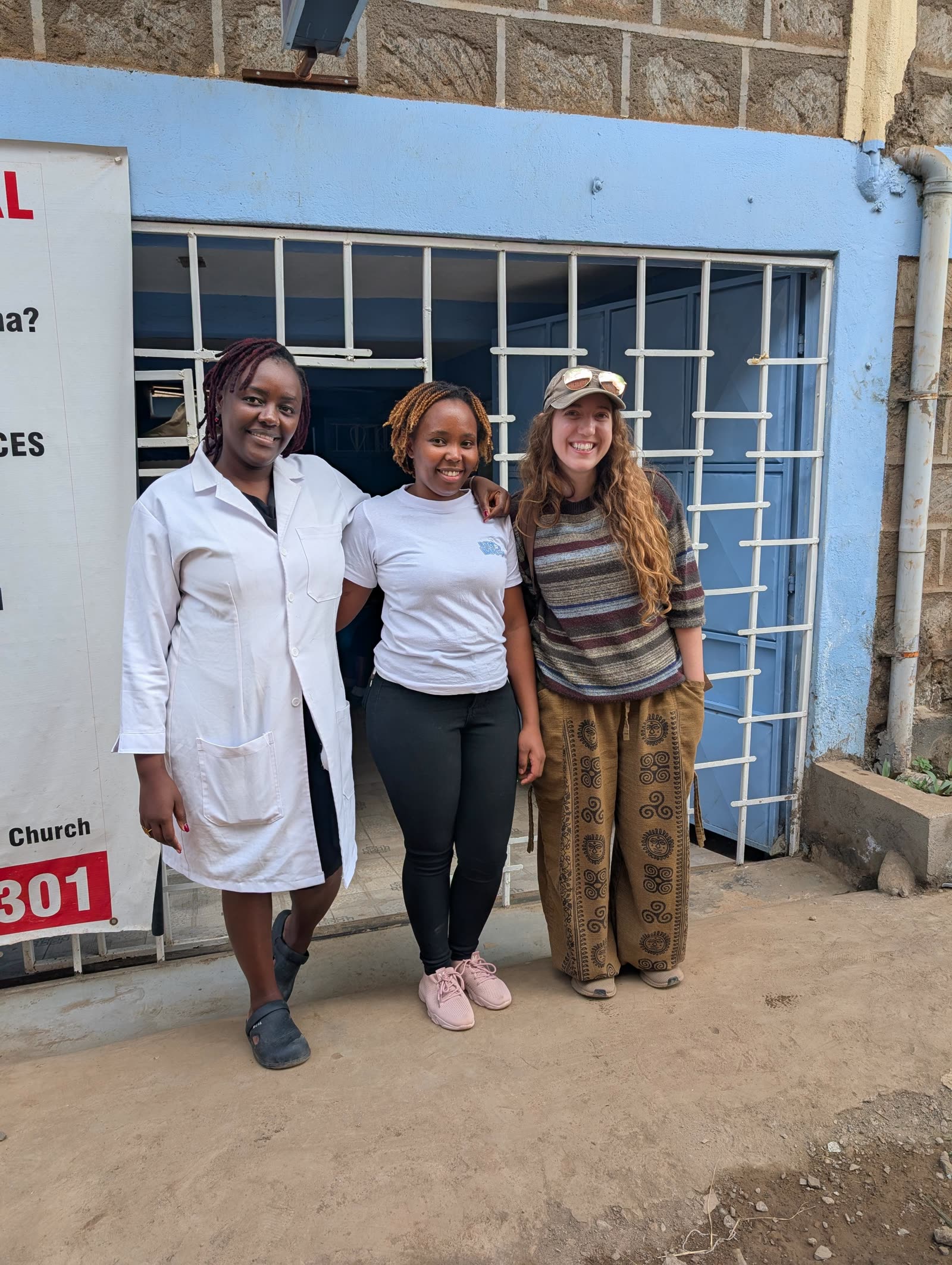 M.K. Fain with Eve of Bitcoin Babies and a clinician at Miale Medical Centre, a Bitcoin-accepting clinic in Matangi, Kenya