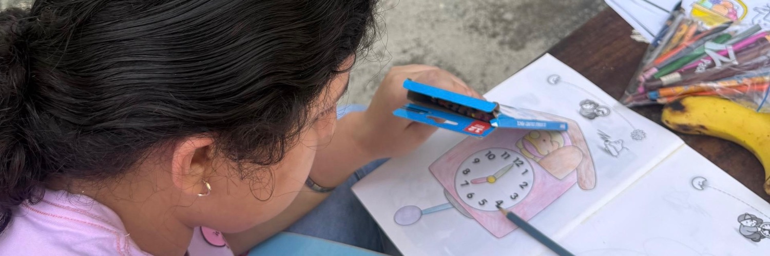 A child at a Proyecto Sonrisa activity for kids displaced by the Venezuela earthquake
